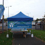 Photo of tent and tear drop banners