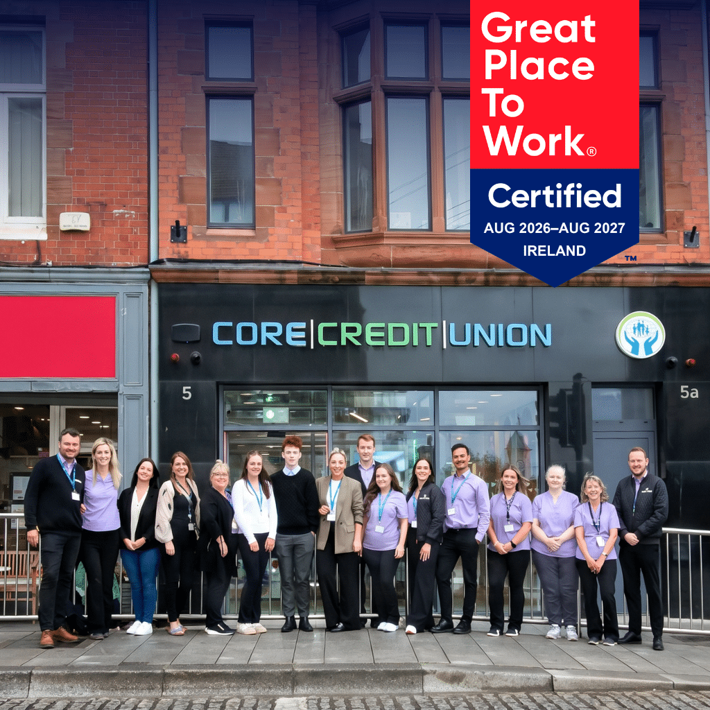 Picture of the team of Core Credit Union standing in line in front of the Dun Laoghaire branch. 
